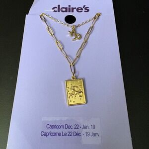 NWT Claires Gold Capricorn Zodiac Layered Set of 2 Necklaces Dec Jan Gift